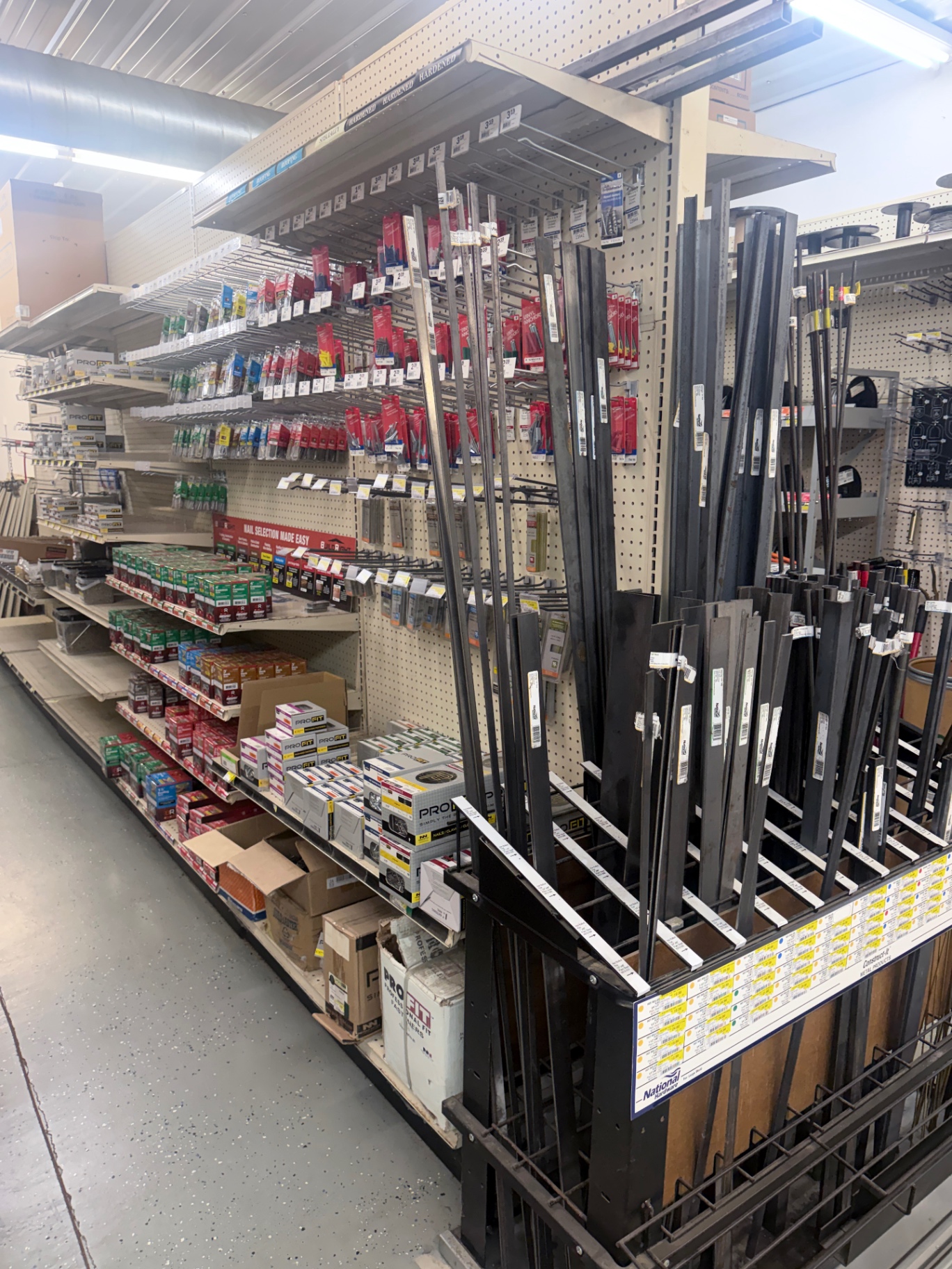 Steel angle, flat bar and metal stock racked in the hardware aisle
