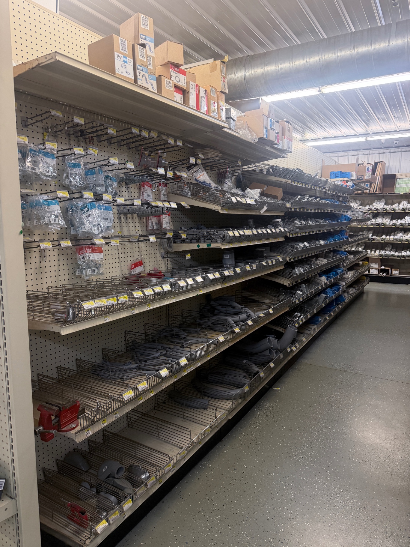Aisle of PVC fittings, plumbing valves and pipe repair parts